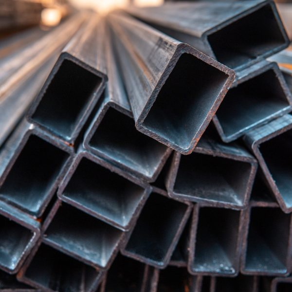 Steel bar for construction.Metal pipe profile. Stock photo of metal beams.